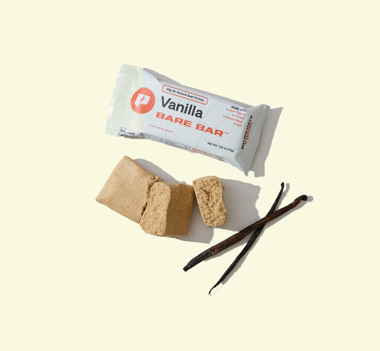 Vanilla Bare Bar with two pieces and a vanilla bean on a beige background